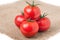 Four tomato isolated on a white background