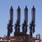 Four towering machinery at chemical plant