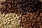 Four types of coffee beans of different roast top view