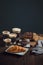 Four types of coffee, espresso, cappuccino, latte and mokiyato in disposable take-away cups with pastries on one table, croissant