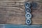 Four vintage buttons on wooden boards