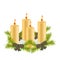 Four wax Christmas candles burning, decorated with fir tree bran