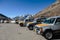 Four wheel drive cars parking area with Yunthang Valley in the background in winter in Zero Point at Lachung. North Sikkim, India