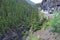 Four wheel drive vehices on dangerous exposed Shelf Road in the Rocky Mountains, Colorado