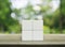 Four white block cubes on wooden table