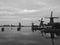 Four windmills on the river Zaan. Black and white. Zaanse Schans, the Netherlands