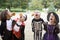 Four young friends on Halloween in costumes