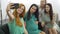 Four young pretty caucasian girls making group selfie. Smiling women taking photo with their pregnant friend. Cheerful