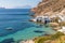 Fourkovouni beach with houses, cliffs and vegetation