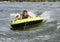 Fourteen year-old Amerasian boy tubing on Grand Lake in Oklahoma.