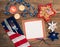 Fourth of July Table Place Setting with red, white and blue decorations and blank card with copy space. It`s a horizontal crop wit
