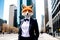 The fox is dressed in a formal suit on the body of a business woman against the background of the streets of a big city