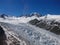 Fox glacier against clear blue sky background, New Zealand