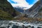 Fox glacier at new zealand. High mountains in valleys and glaciers in the morning