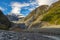 Fox glacier at new zealand. High mountains in valleys and glaciers in the morning