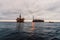 FPSO tanker vessel near Oil Rig platform. Offshore oil and gas industry