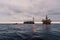 FPSO tanker vessel near Oil Rig platform. Offshore oil and gas industry