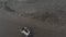 FPV freestyle sport drone follow travel couple riding motorbike on beach