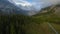 FPV maneuverable flight above the lake Oeschinensee in Swiss Alps, Switzerland.