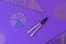 Fractions, rulers on violet background. Set of supplies for mathematics and for school. Back to school