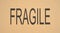 Fragile sign printed on cardboard