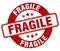 fragile stamp. fragile label. round grunge sign