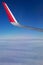 Fragment of an airplane wing during flight, view from the porthole