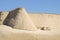 Fragment of an ancient defensive wall with a tower. Inner city of Ichan-Kala. Khiva