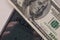 A fragment of a bill of 100 US dollars. Portrait of Benjamin Franklin