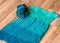 A fragment of a blue knitted sweater of different shades, leisure concept, handmade