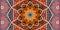 Fragment of bright ornamental rug in ethnic style with mandala, flowers and beautiful frame