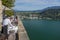 Fragment of a cafe with a waiter on the territory of Bled Castle on the background of a lake in