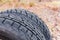 Fragment of the car tires with asymmetric tread close-up