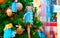 Fragment of Christmas tree decorated with gifts and ornaments new