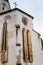 Fragment of the church and the watchtower with the clock of the Fortified Church Prejmer in Prejmer city in Romania