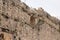 A fragment of the city wall encircling the old city near the Dung Gate, near the Temple Mount in Jerusalem in Israel