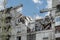 A fragment civilian building in Toretsk, Donetsk region, damaged by a Russian artillery shell (war concept)