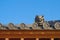 Fragment of classical Japanese,Korean rooftop against blue sky with traditional decorative elements and repeatable patterns