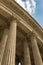 Fragment of the colonnade of the Kazan Cathedral in St. Petersburg against the blue sky