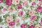 Fragment of colorful retro tapestry textile pattern with floral