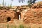 Fragment of defense brick wall with embrasure of mediaeval fortress