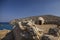 Fragment of a defense tower and walls in the Spinalonga fortress. Sea view from the leper island in Greece