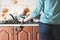 Fragment of the female body, handcuffed to the kitchen counter