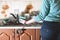 Fragment of the female body, handcuffed to the kitchen counter