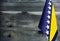 Fragment of the flag of Bosnia and Herzegovina in the foreground blurred background copy space