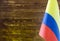 Fragment of the flag of Colombia in the foreground place for text blurred background