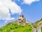 Fragment of the Great Wall of China on a background of blue cloudless sky