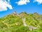 Fragment of the Great Wall of China on a background of blue cloudless sky