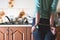 Fragment of the handcuffed female body at the kitchen counter, f