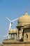 Fragment of a Hindu temple on the background of wind turbine shot in Jaisalmer, India